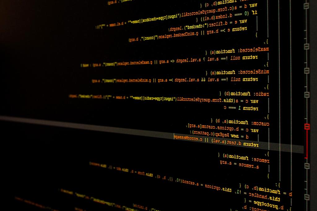 Software code on monitor screens